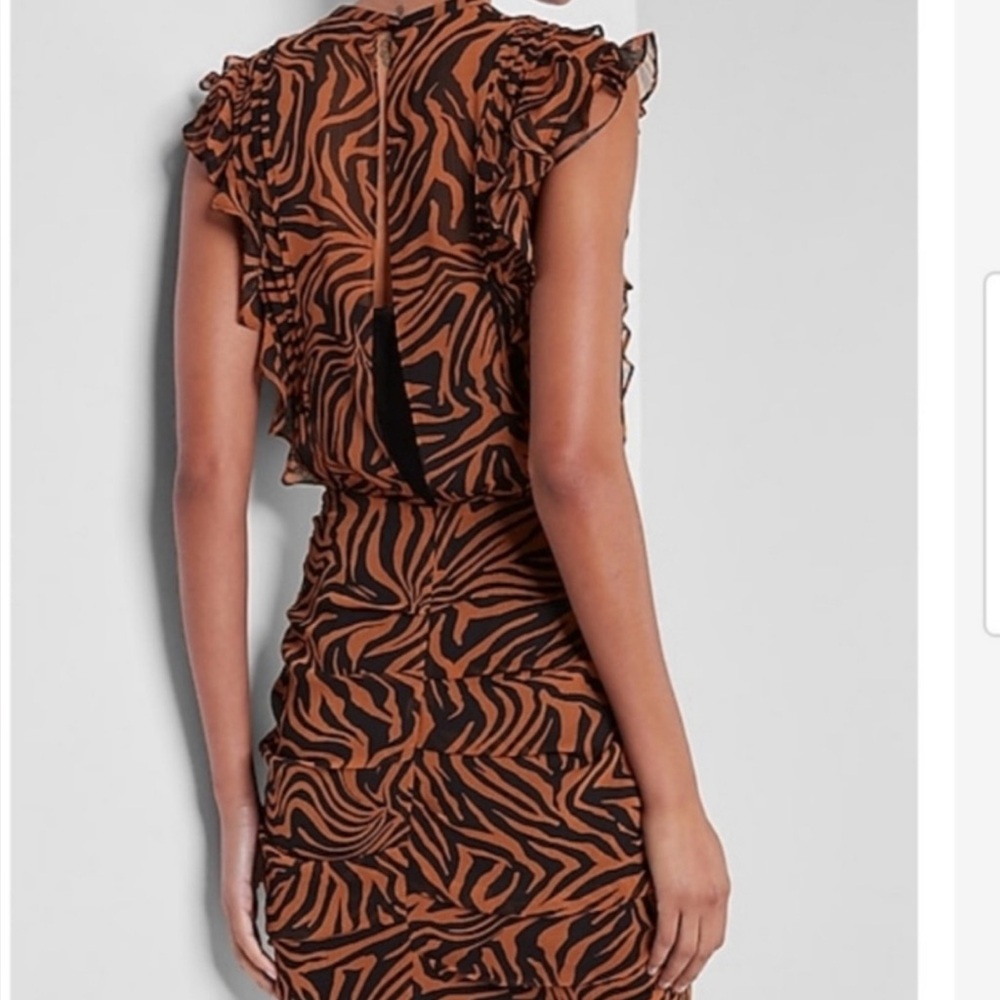 Express Tiger print  flattering dress with partially open back.
New never worn